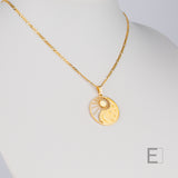 Collier Yin Yang Cosmique – vue détaillée du bijou artisanal Atelier-Émile