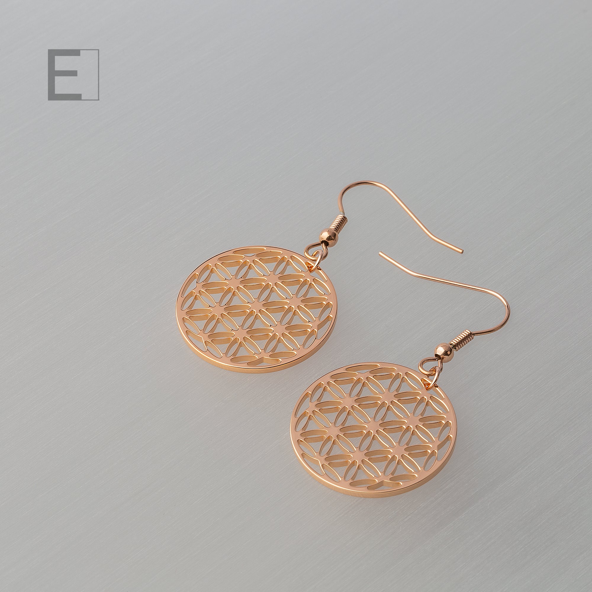 Boucles d'oreilles Fleur de Vie en finition or rose en vue principale – création artisanale Atelier-Émile