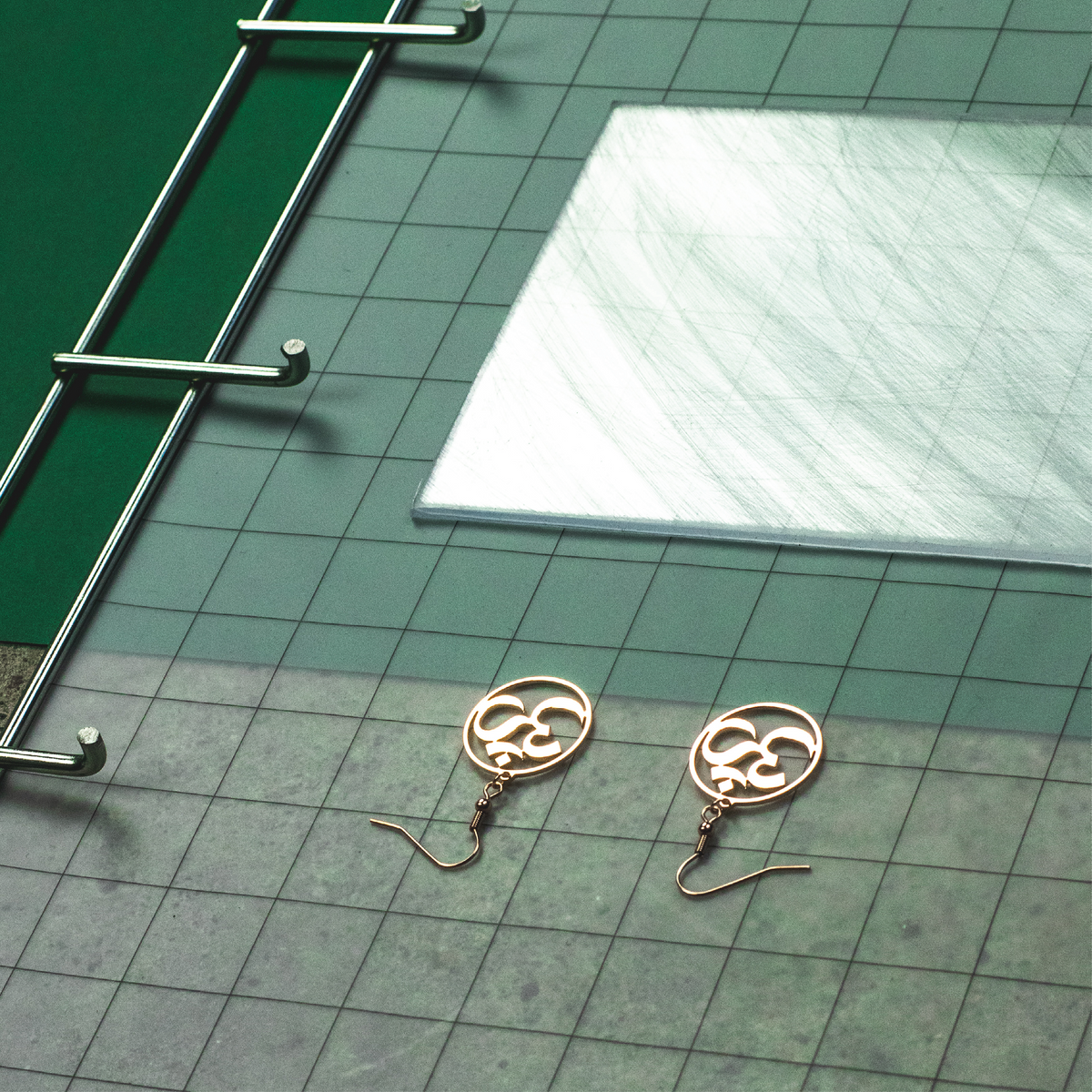 Om Symbol Earrings, detail view 5 – Atelier-Émile