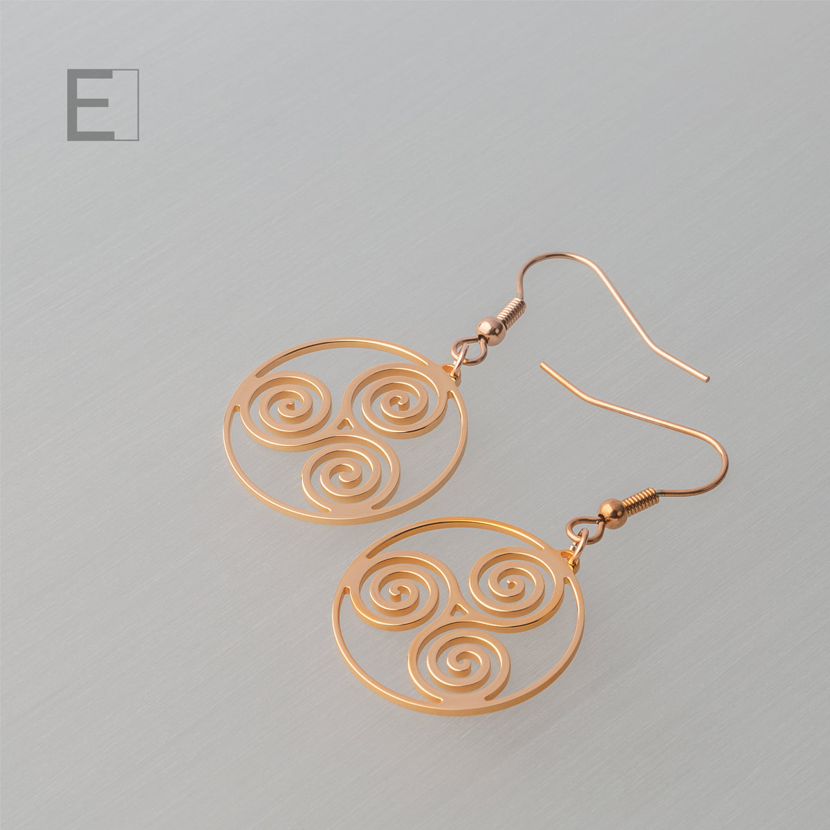 Spiral of Life Earrings, with a rose gold finish, detail view 4 – Atelier-Émile