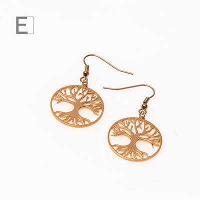Boucles d’oreilles Arbre de Vie en plaqué or rose sur fond blanc – Atelier-Émile